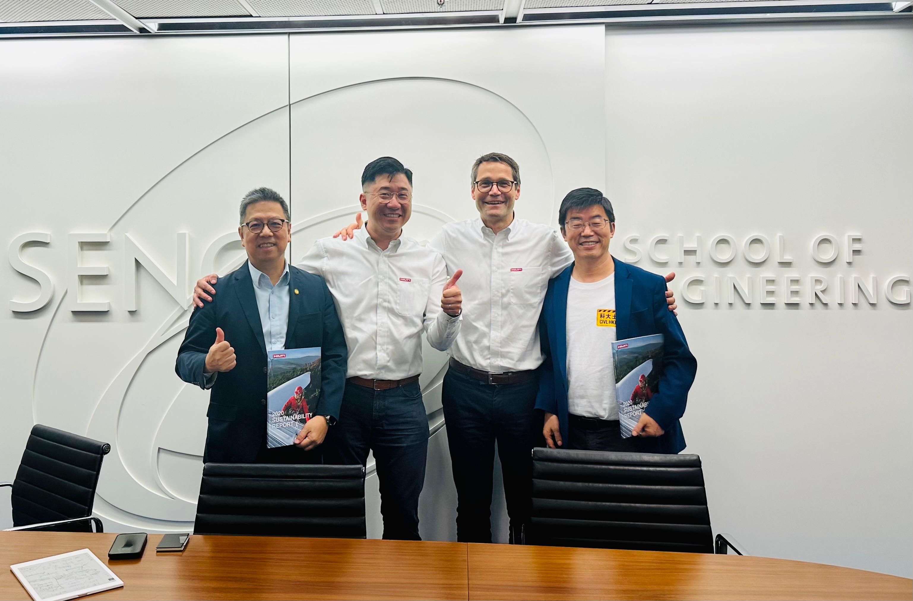 Hilti management meeting with HKUST professors, showcasing the dedication of Michael (second left) to fostering industry–faculty collaboration. Pictured with Hilti Executive Board member Thomas Hillbrand (second right), Prof. Hong K. Lo, Dean of Engineering, HKUST (first left) and Prof. Zhang Limin, Head and Chair Professor, Department of Civil and Environmental Engineering, HKUST (first right).